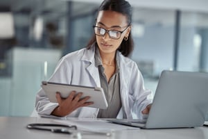 Clinical researcher studying participant data
