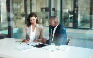 Manager going over development plan with employee