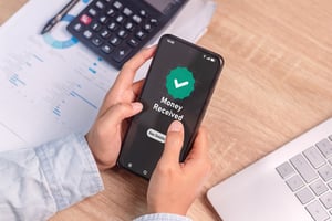 Employee receiving instant digital incentive via mobile phone