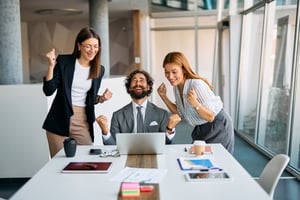 Employees celebrating success and receiving rewards