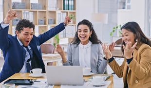 Excited sales team getting motivated 