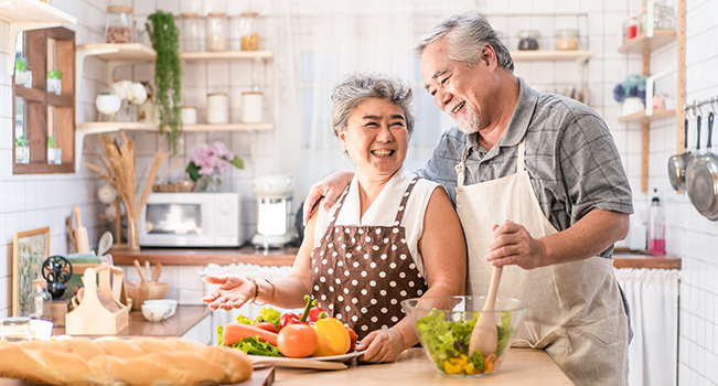 elderly people cooking 