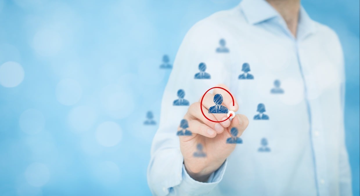 Professional employee circling individual customer icon for customized service