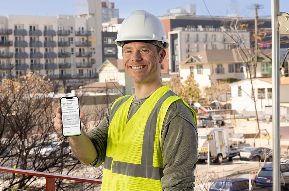 Construction employee receiving Engage2Reward Choice Card as safety incentive