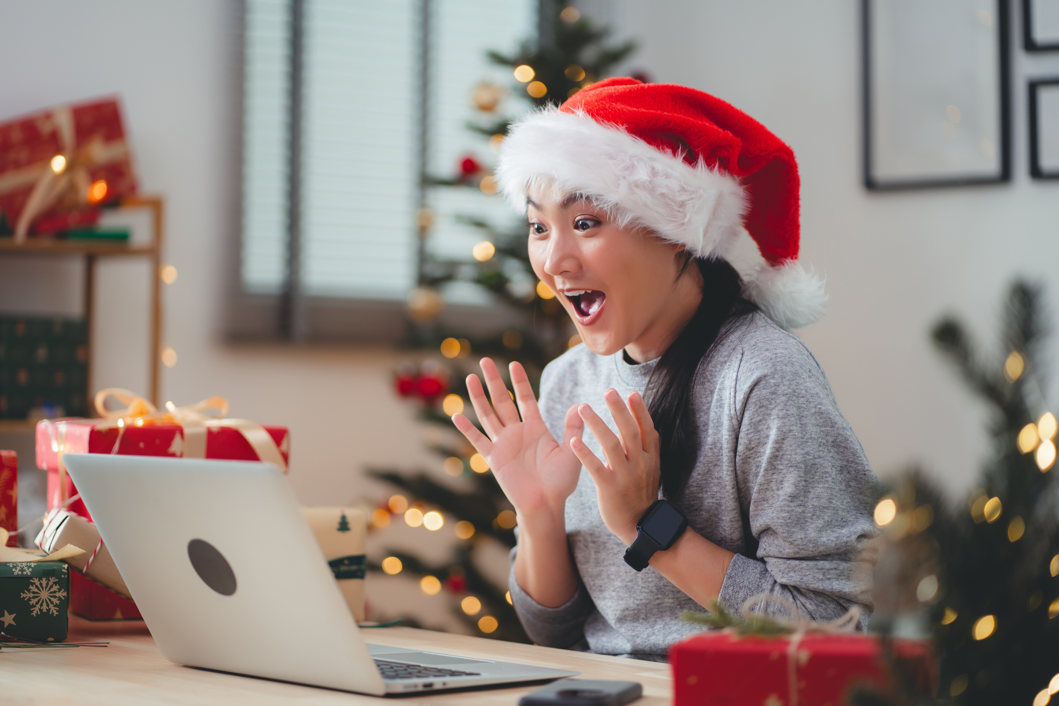 happy employee after getting an egift card from her boss